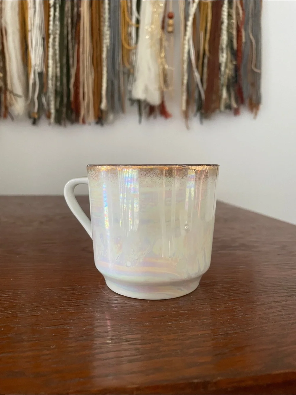 Iridescent Porcelain Teacup with Pink Rose Motif